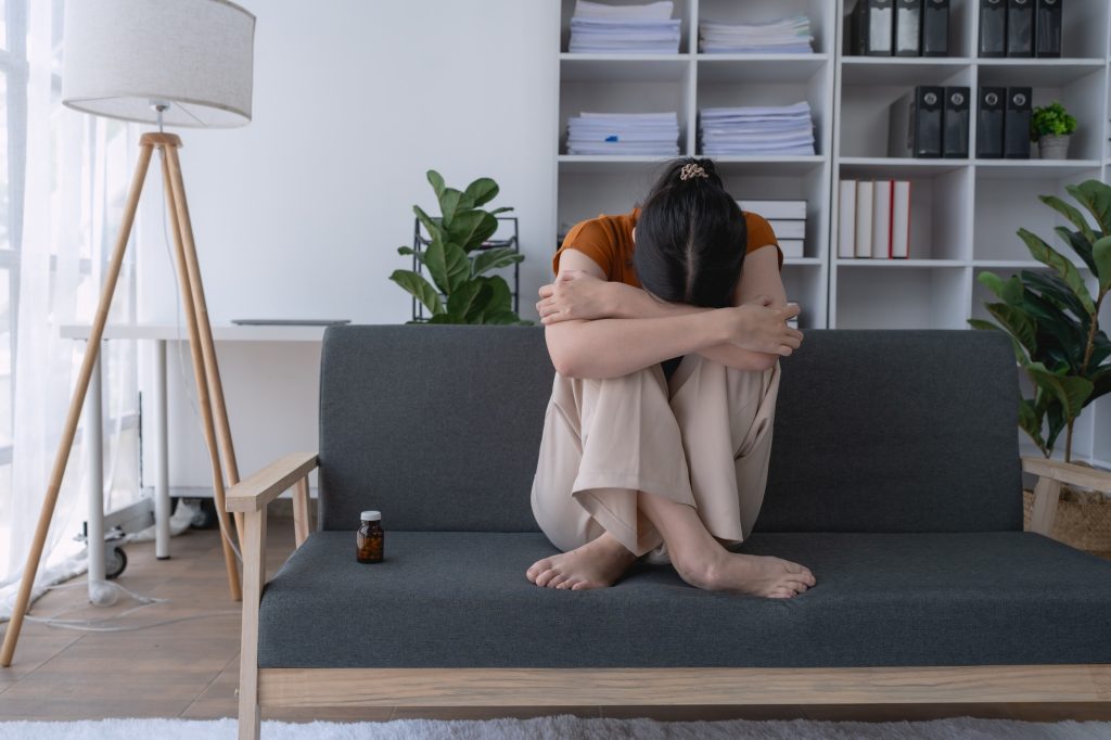 woman, overwhelmed by depression, felt trapped in a cycle of stress, her mind, struggling to find ho